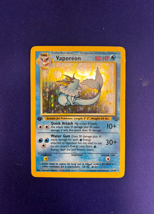Vaporeon Holo DMG 12/64 Jungle