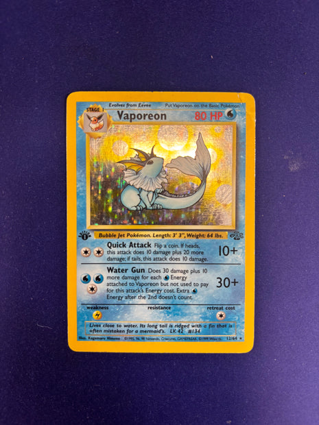 Vaporeon Holo DMG 12/64 Jungle